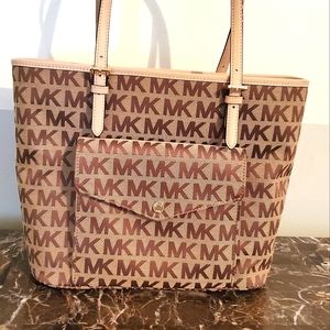 Michael Kors jet set purse with original tags.